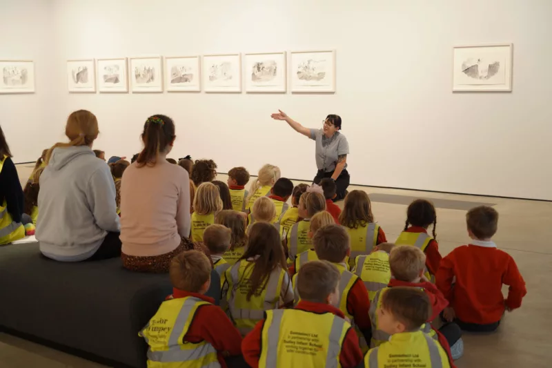 A group of children on a school visit in our gallery space