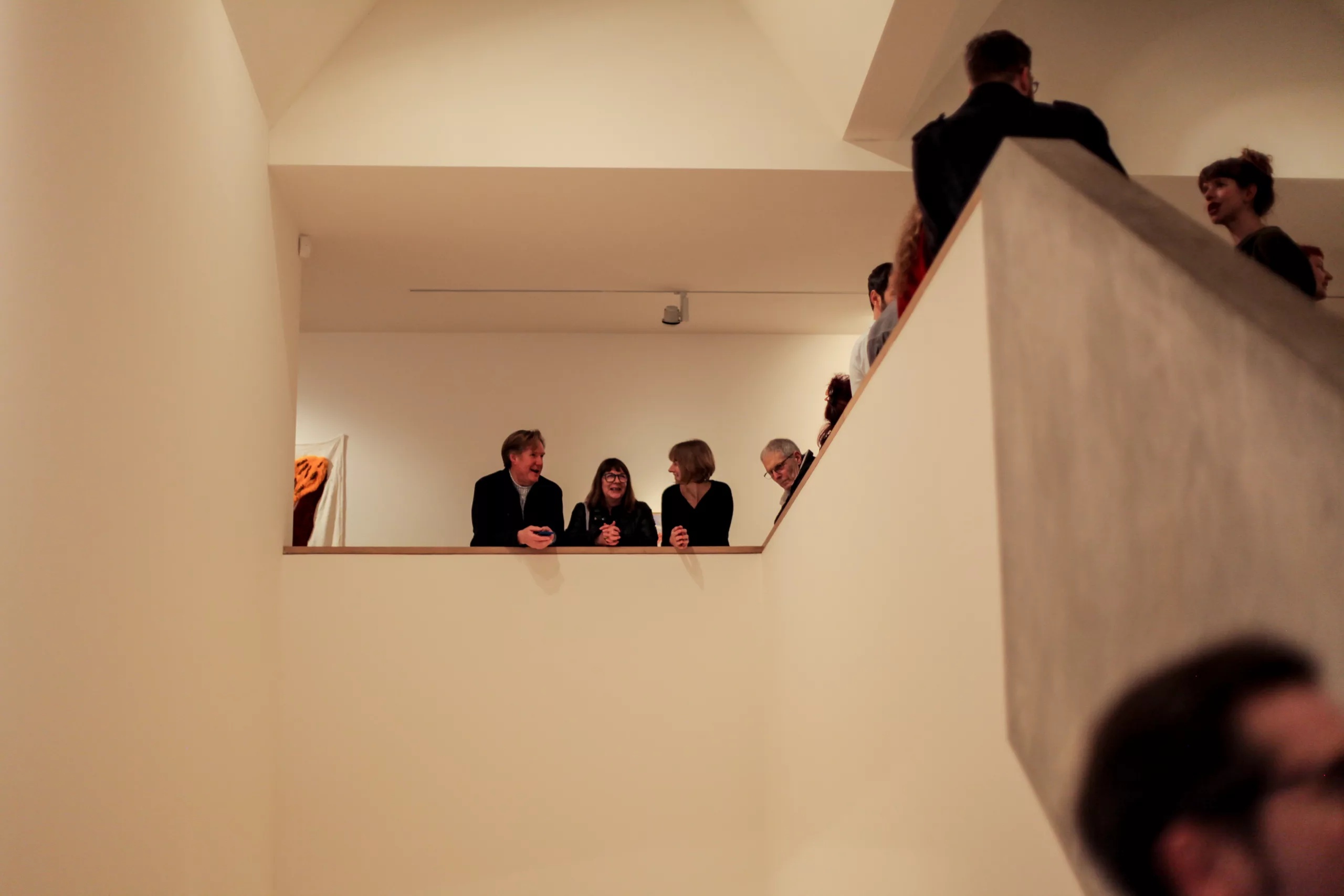 Visitors to an exhibition opening in the gallery